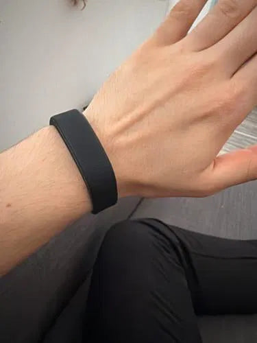 Sovune Nudge silent vibrating alarm wristband — on customer's wrist