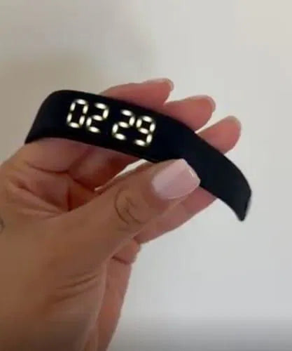 Sovune Nudge silent vibrating alarm wristband — customer showing Nudge