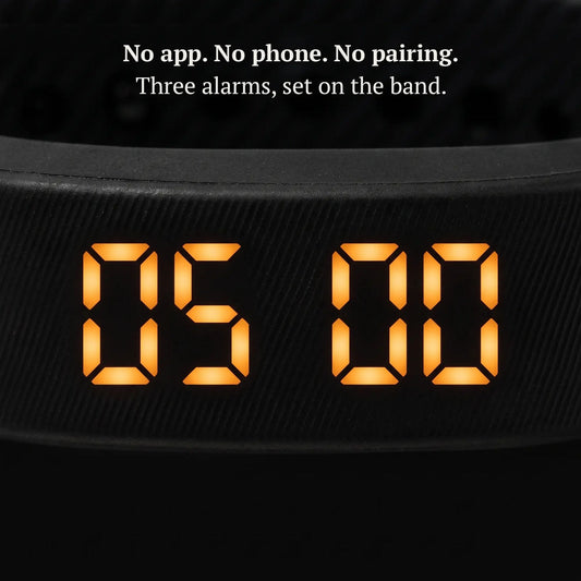 Sovune Nudge display showing a 5:00 am alarm, a silent alarm that won't wake your roommate