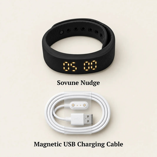Sovune Nudge vibrating alarm wristband with its USB charging cable