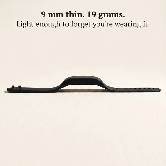 Side profile of the slim Sovune Nudge vibrating alarm wristband