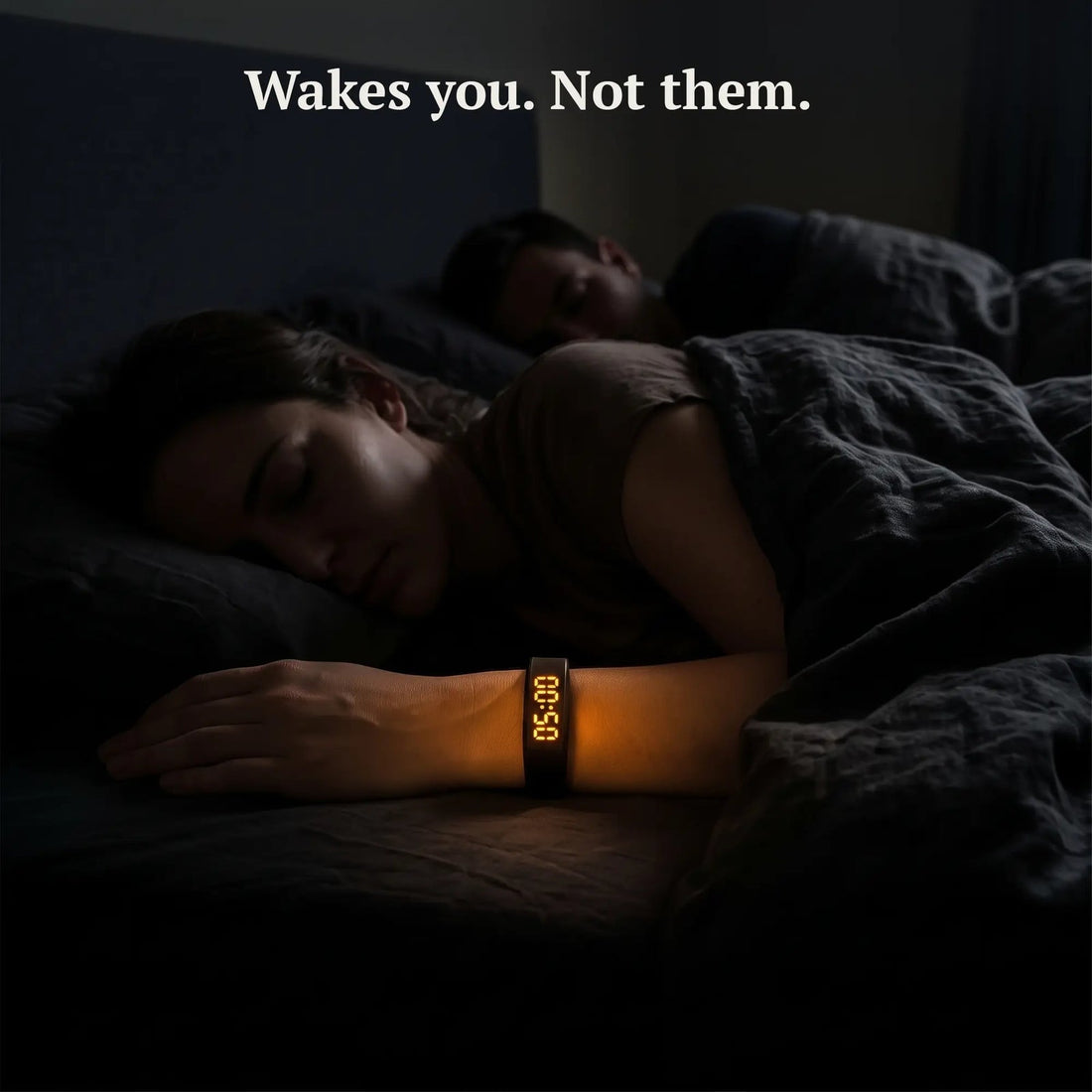 Person wearing the Sovune Nudge vibrating alarm in bed while their partner sleeps, compared with a sunrise alarm