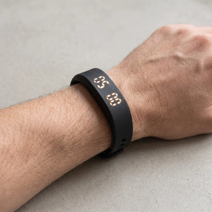 Wristband worn on a wrist in daylight