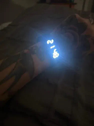 Sovune Nudge silent vibrating alarm wristband — on customer's wrist