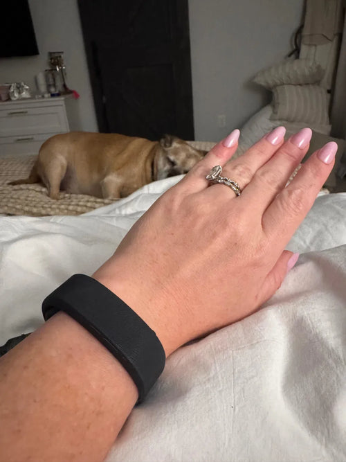Sovune Nudge silent vibrating alarm wristband — on customer's wrist