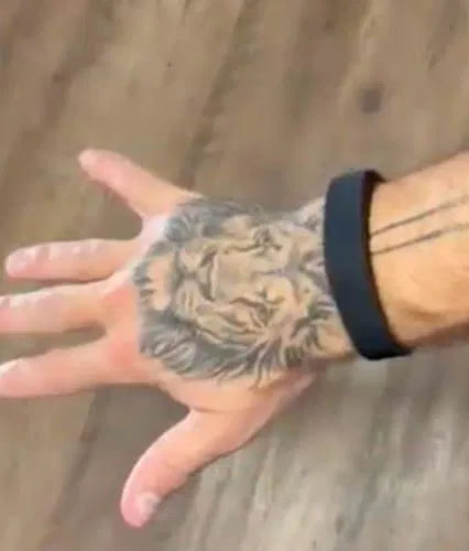 Sovune Nudge silent vibrating alarm wristband — on customer's wrist